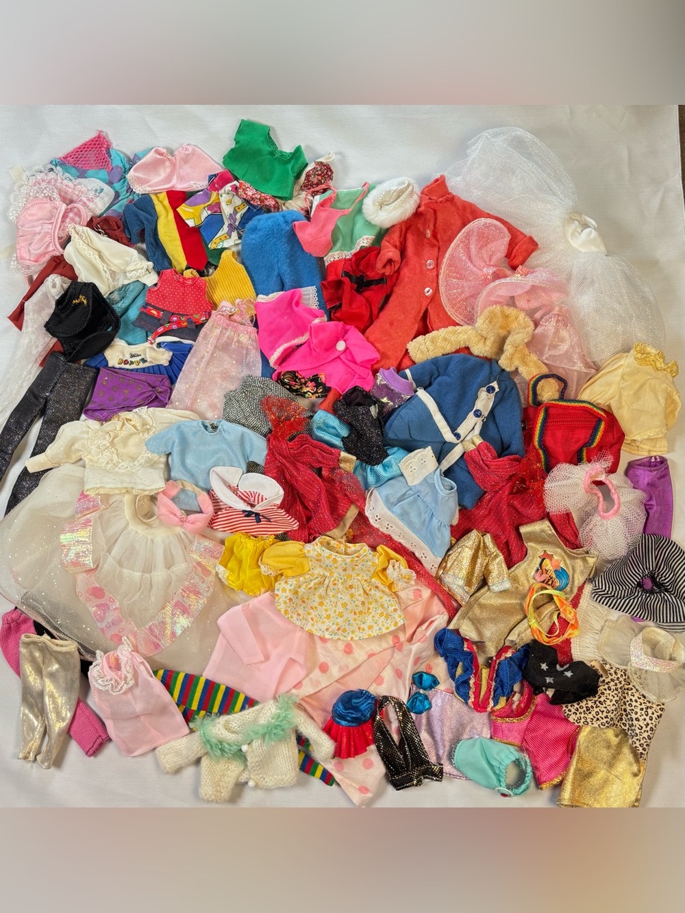 Vintage Barbie and mixed doll clothes lot
